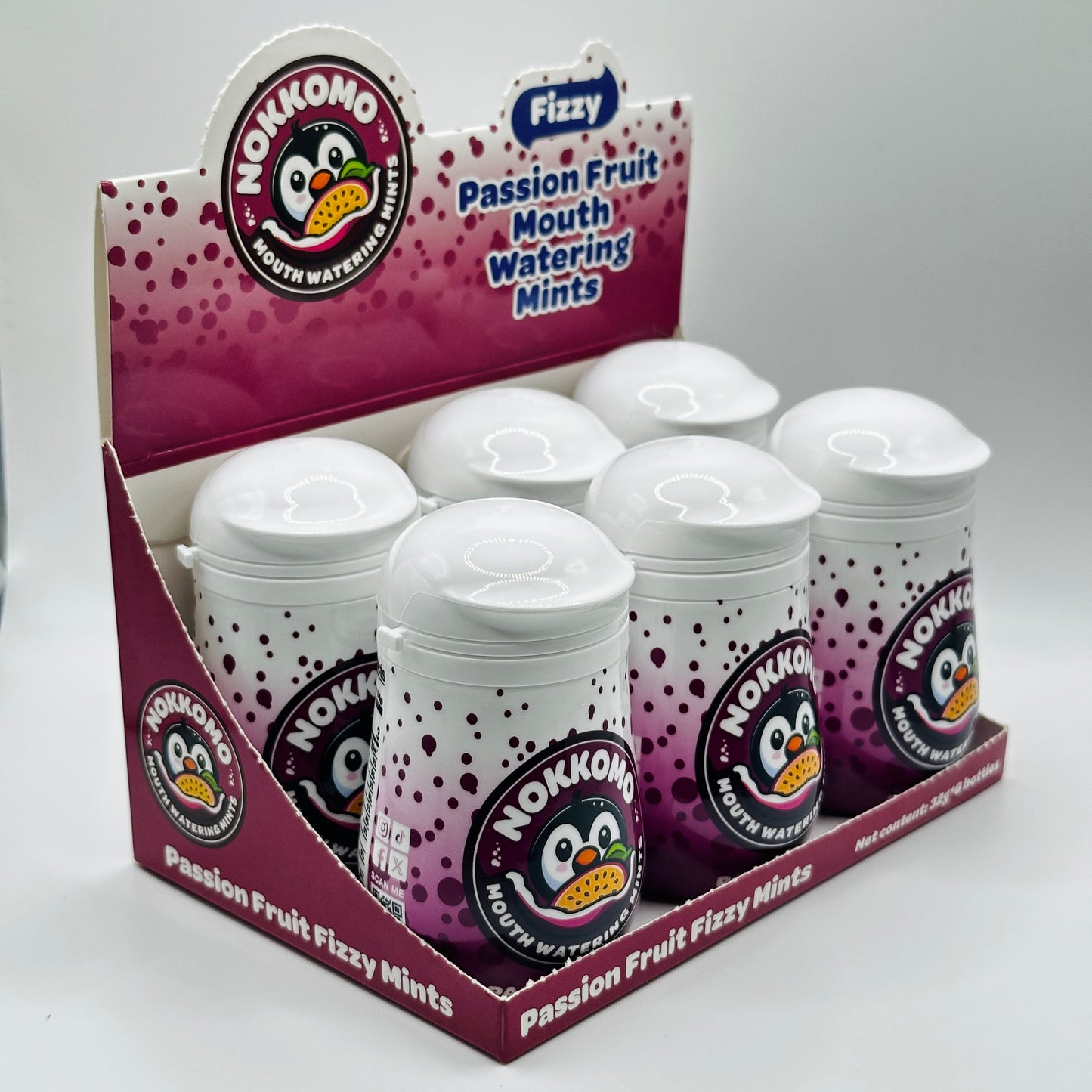 Display box of Nokkono Passion Fruit Fizzy Mints with multiple containers.