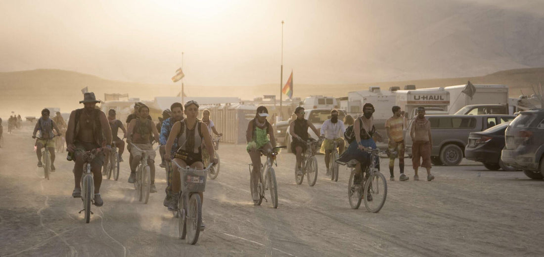 people on bicycles at burning man 