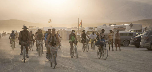 people on bicycles at burning man 