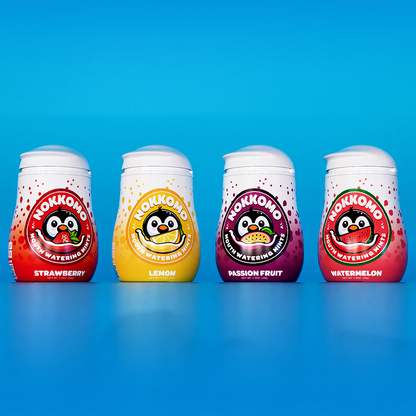 Four Nokkono fruit watermelon bottles with colorful labels on a blue background