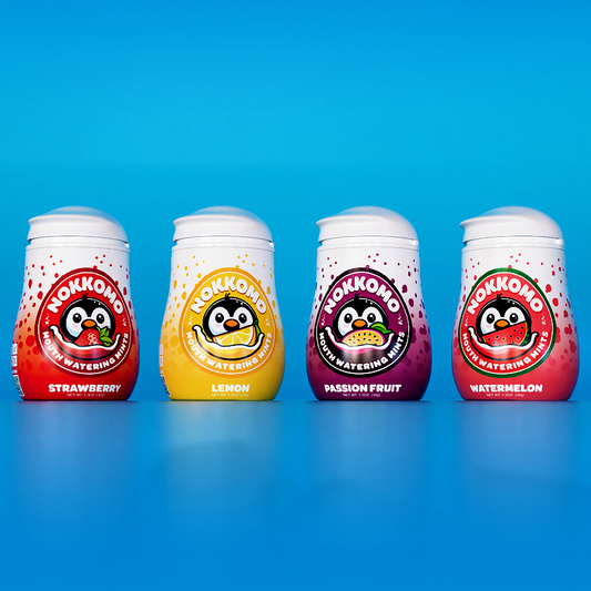Four Nokkono fruit watermelon bottles with colorful labels on a blue background